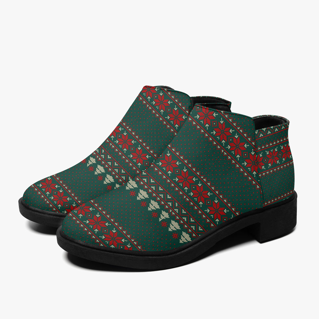 Green, red, and cream festive Christmas sweater ankle boots with chunky black heel and zipper closure.