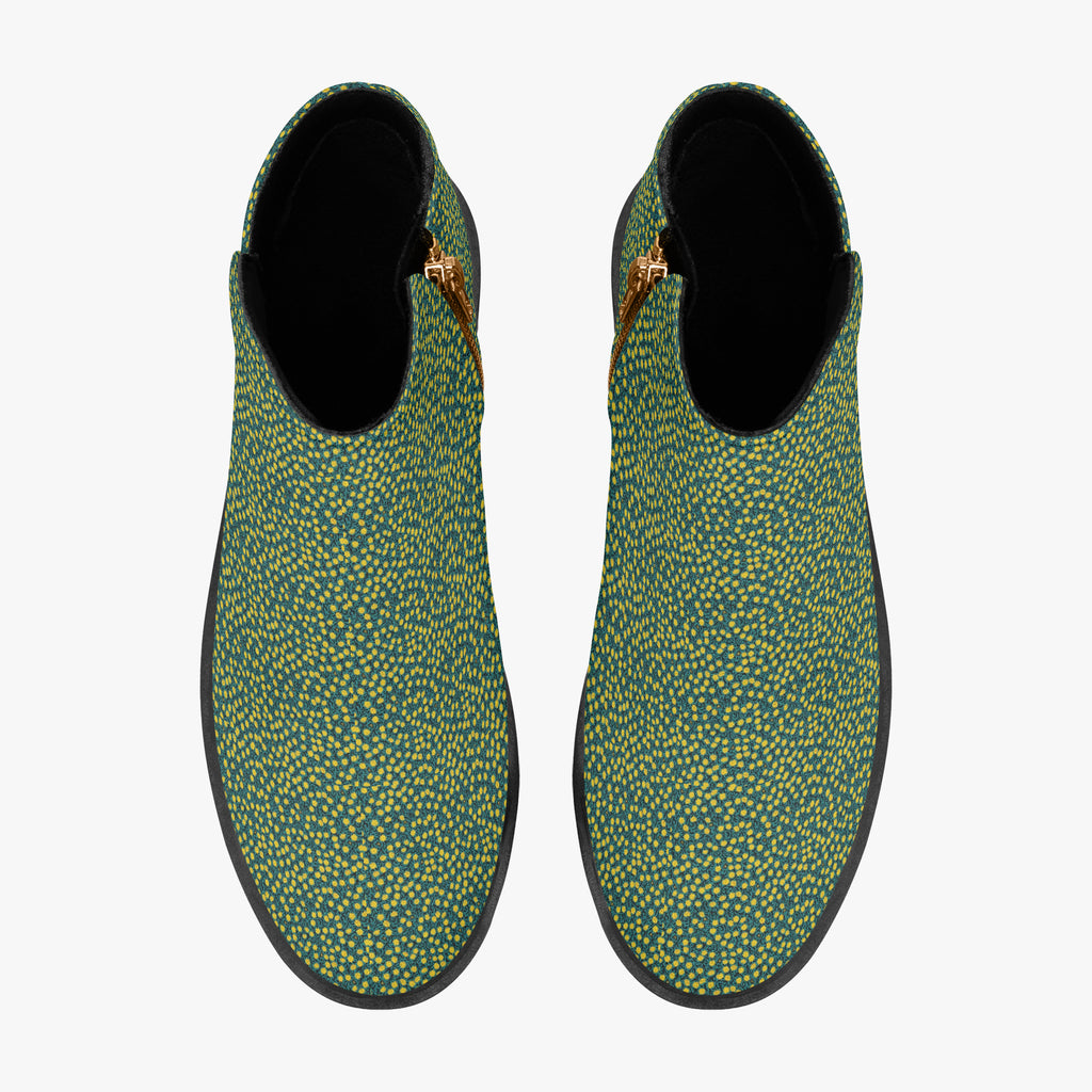 Teal ankle boots with sunny yellow polka dots, chunky black heels, and side zippers.