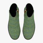 Teal ankle boots with sunny yellow polka dots, chunky black heels, and side zippers.