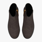 Dark brown floral lace ankle boots with chunky black heels and gold side zippers, top view.