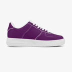 Low-top classic purple leather sneakers with white laces and white rubber sole.