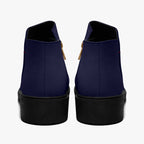 Navy blue slip-on booties with chunky black heels and red accent stitching, back view.