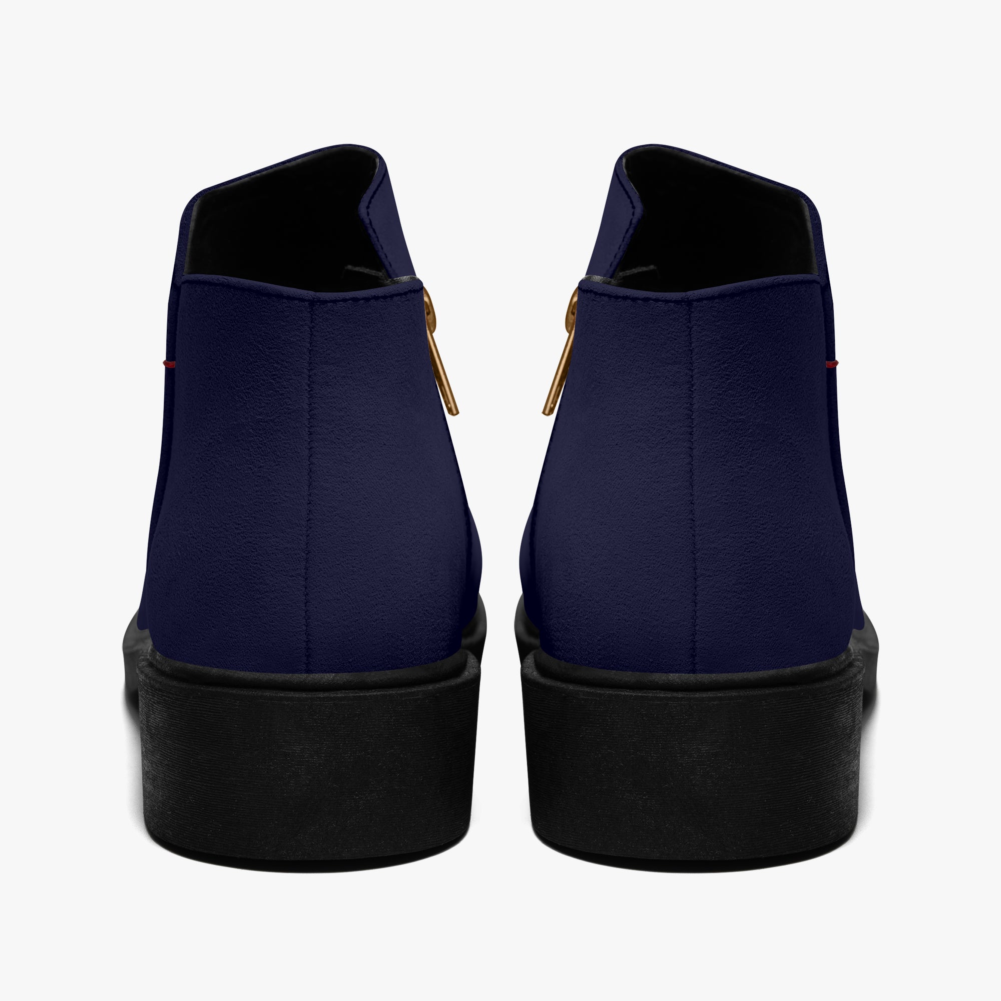 Navy blue slip-on booties with chunky black heels and red accent stitching, back view.