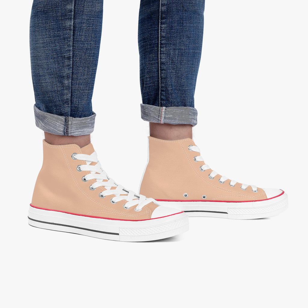 Peach high-top canvas sneakers with white laces and red trim on white platform soles.