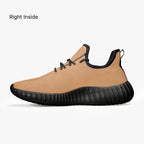 Beige knit low-top sneaker with black sole, black laces, and black heel collar lining.