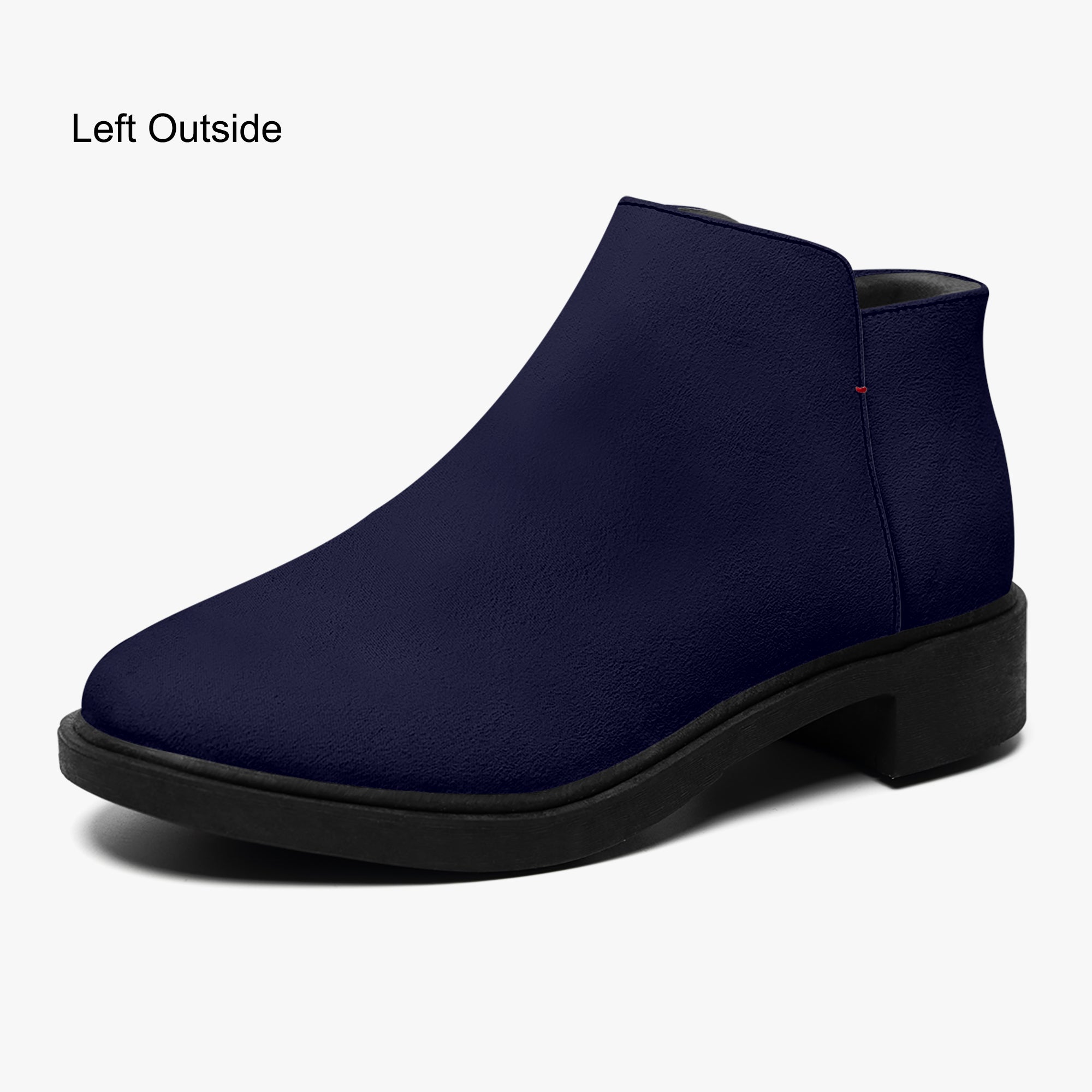 Navy blue slip-on bootie with chunky black heel and subtle red accent stitch on outer side.