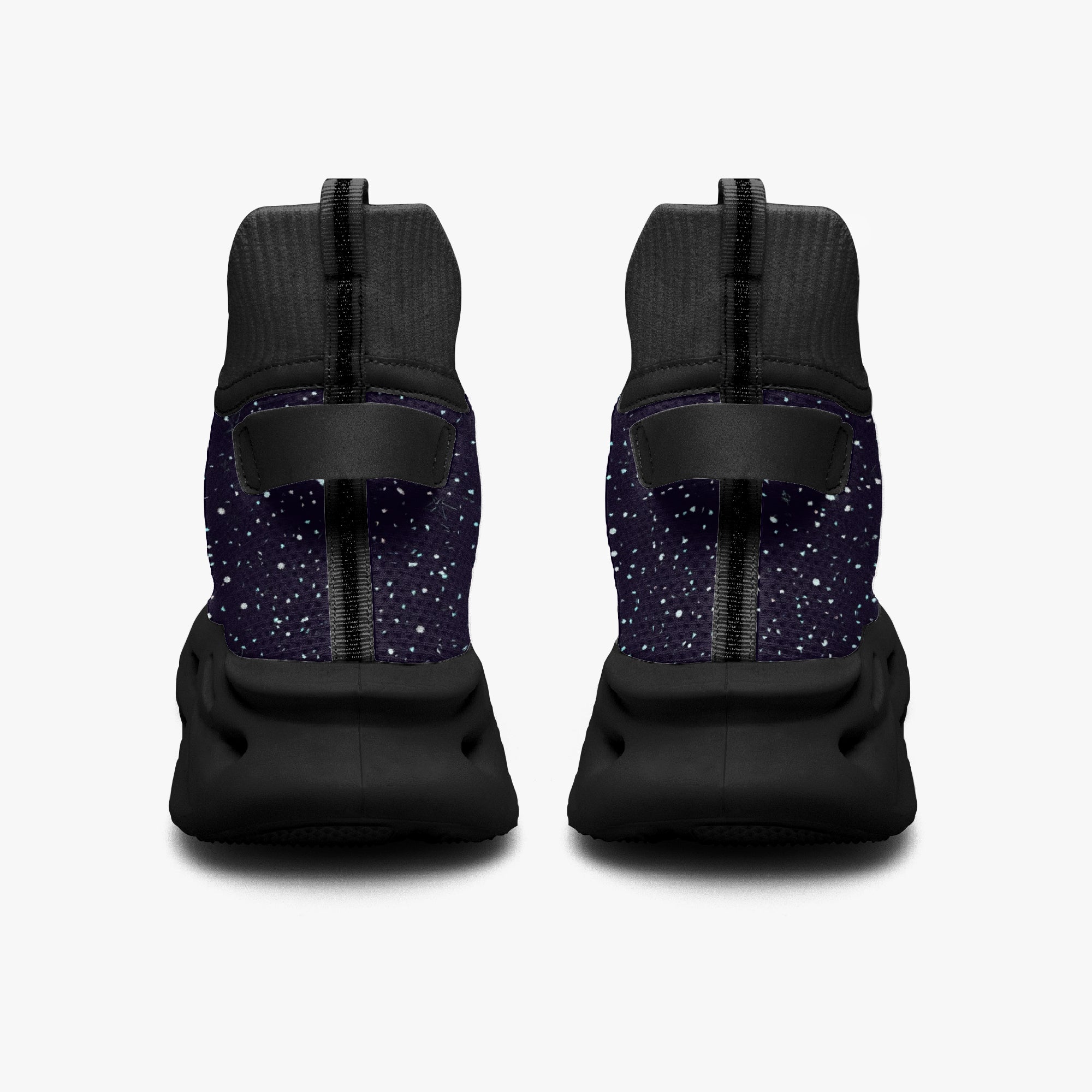 Black high-top sneakers with cosmic white speckle knit upper and solid black sole, rear view.