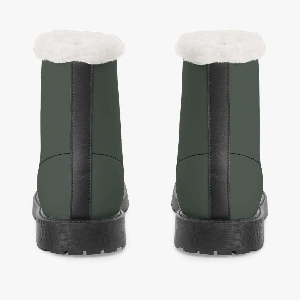 Pair of forest green lace-up boots with plush white faux fur collars and black thick soles, back view.