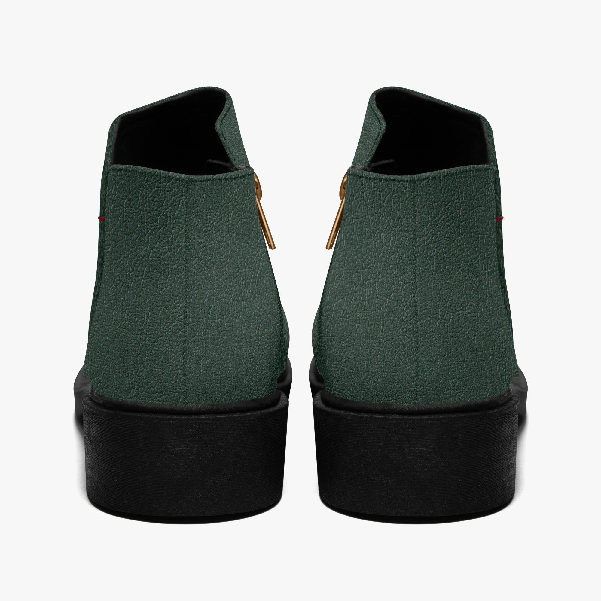 Dark green textured ankle boots with chunky black heels and gold side zippers, viewed from the back.