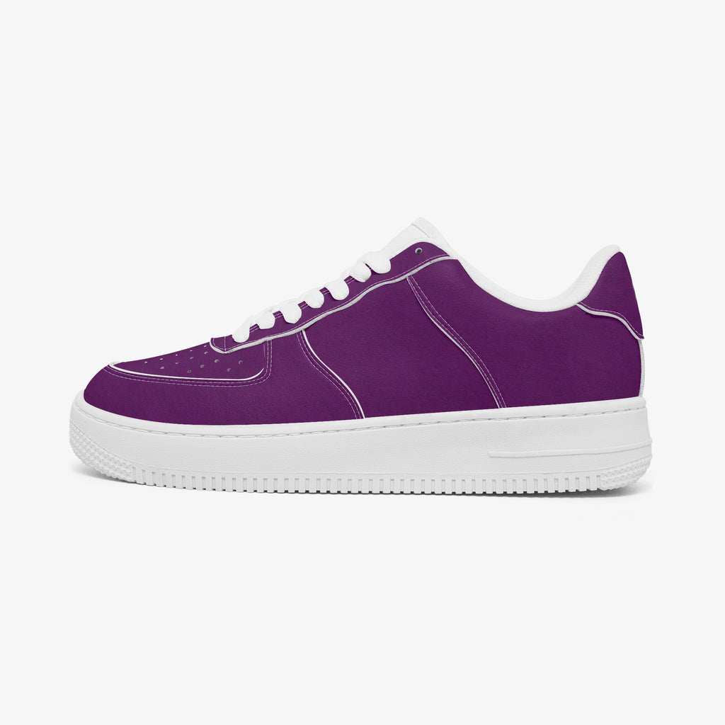 Purple low-top leather sneakers with white laces and thick white rubber sole.