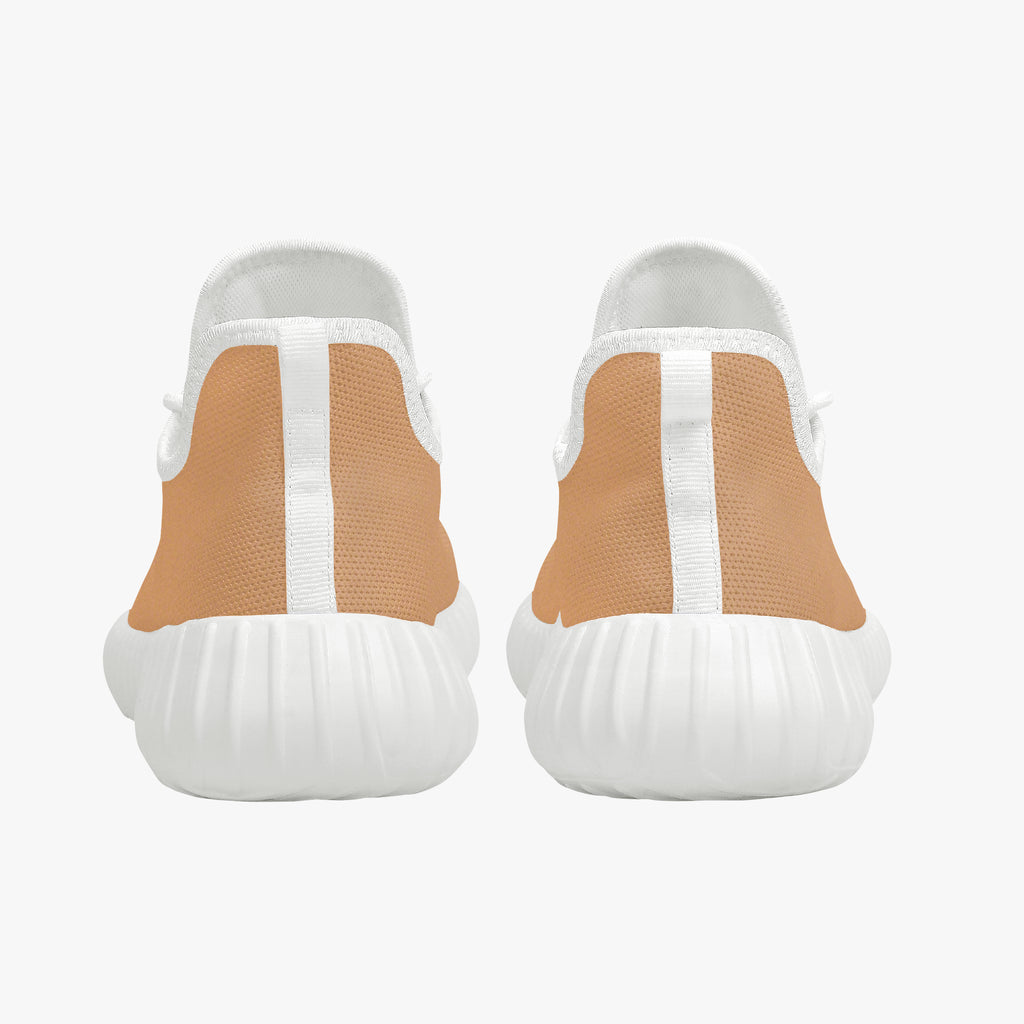 Beige knit low-top sneakers with white textured soles and vertical white strip on heel.