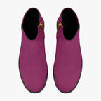 Magenta suede ankle boots with rounded toes and black chunky heels viewed from above.