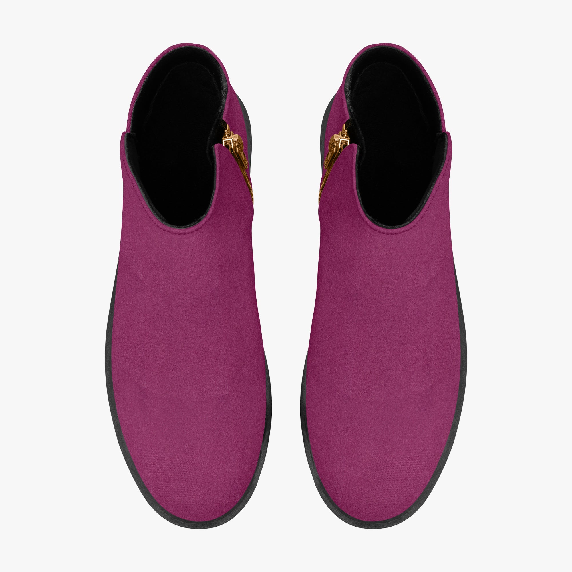 Magenta suede ankle boots with rounded toes and black chunky heels viewed from above.