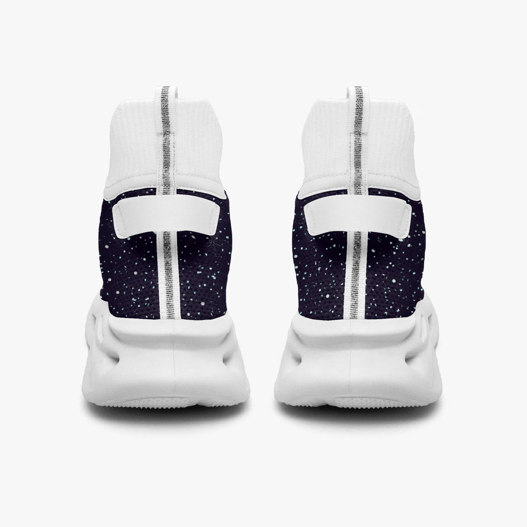 High-top black mesh knit sneakers with white speckle pattern and thick white sole, back view.