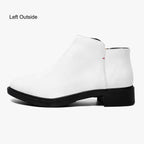 White slip-on bootie with chunky black heel and red accent stitching on side.