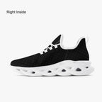 Black speckled knit sneaker with white cushioned sole and breathable mesh upper.