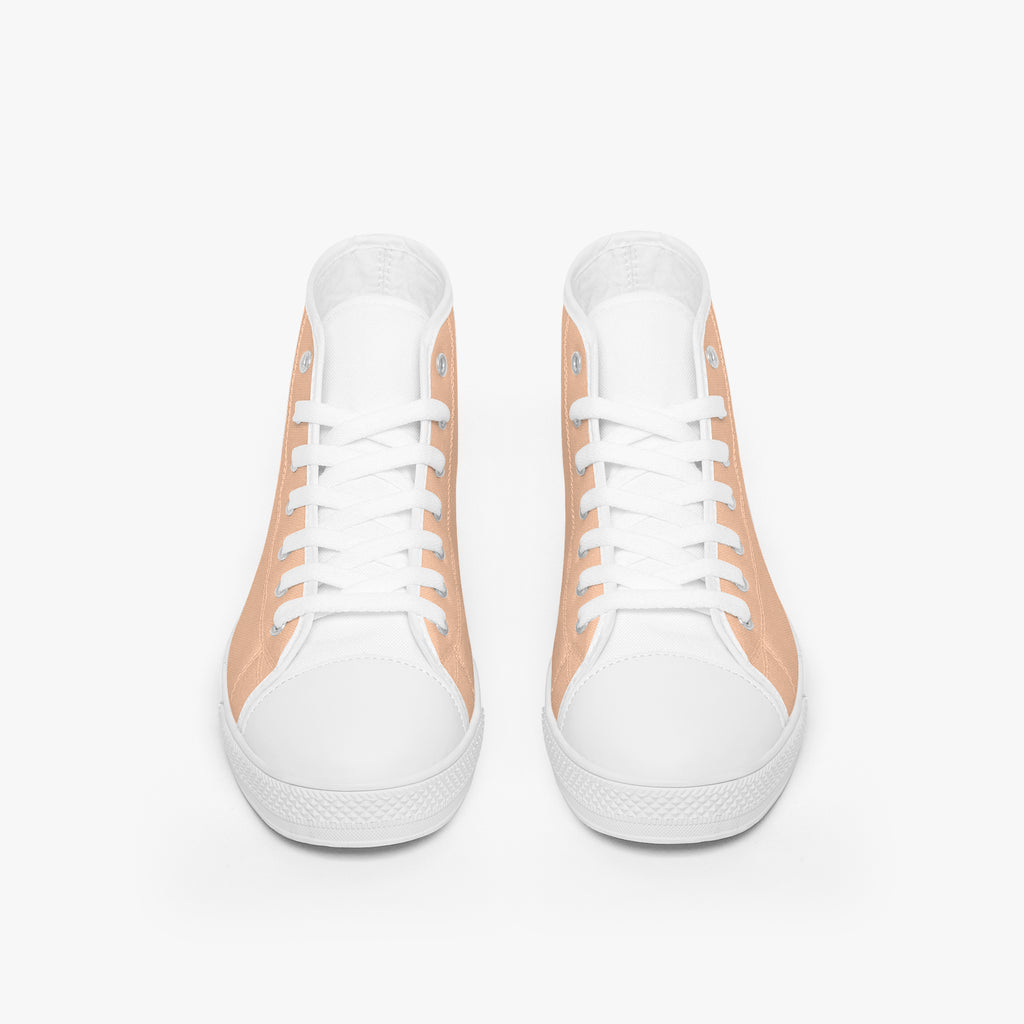 White and peach high-top canvas sneakers with white laces and rubber soles, front view.