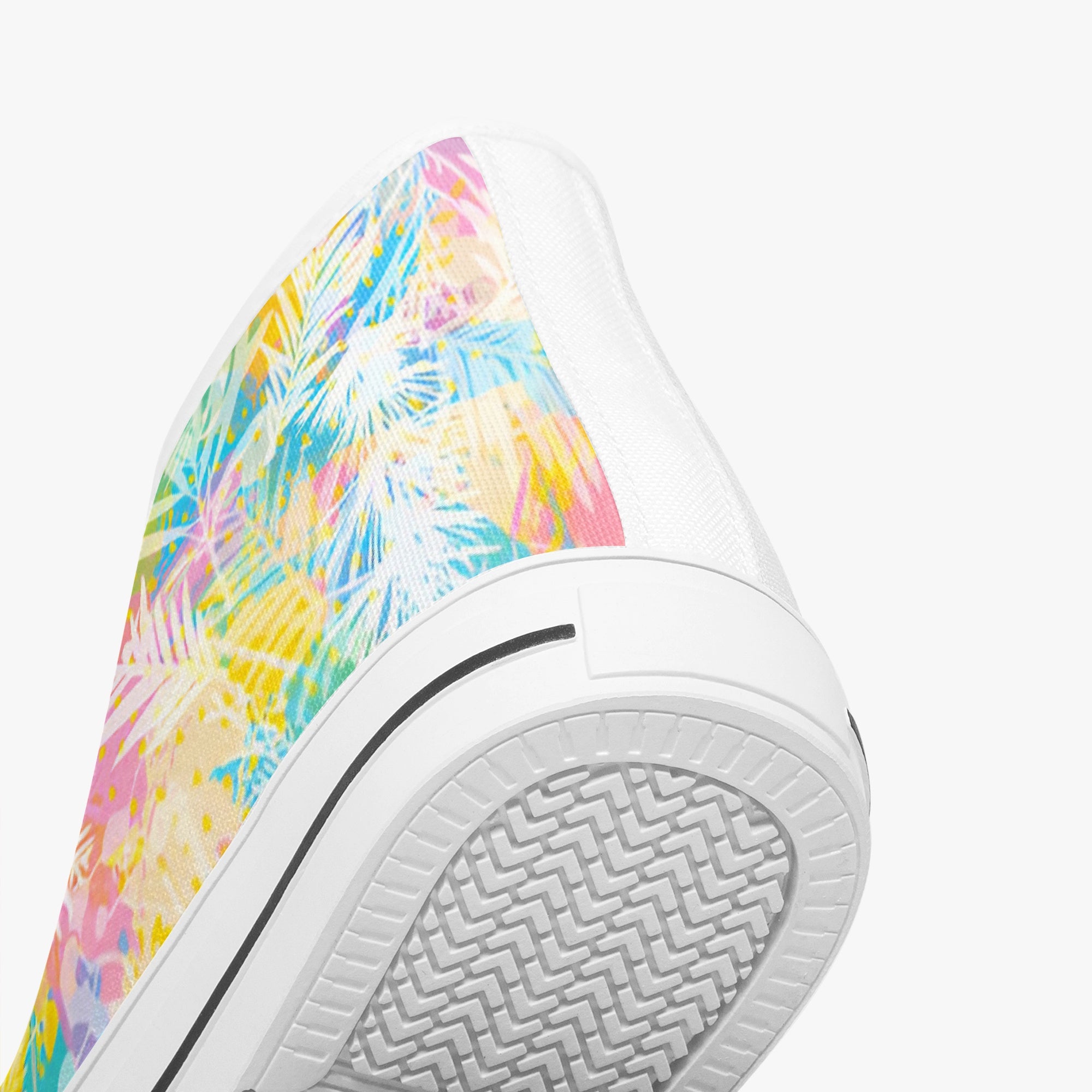White high-top sneaker with colorful rainbow palm leaf pattern and textured rubber sole.