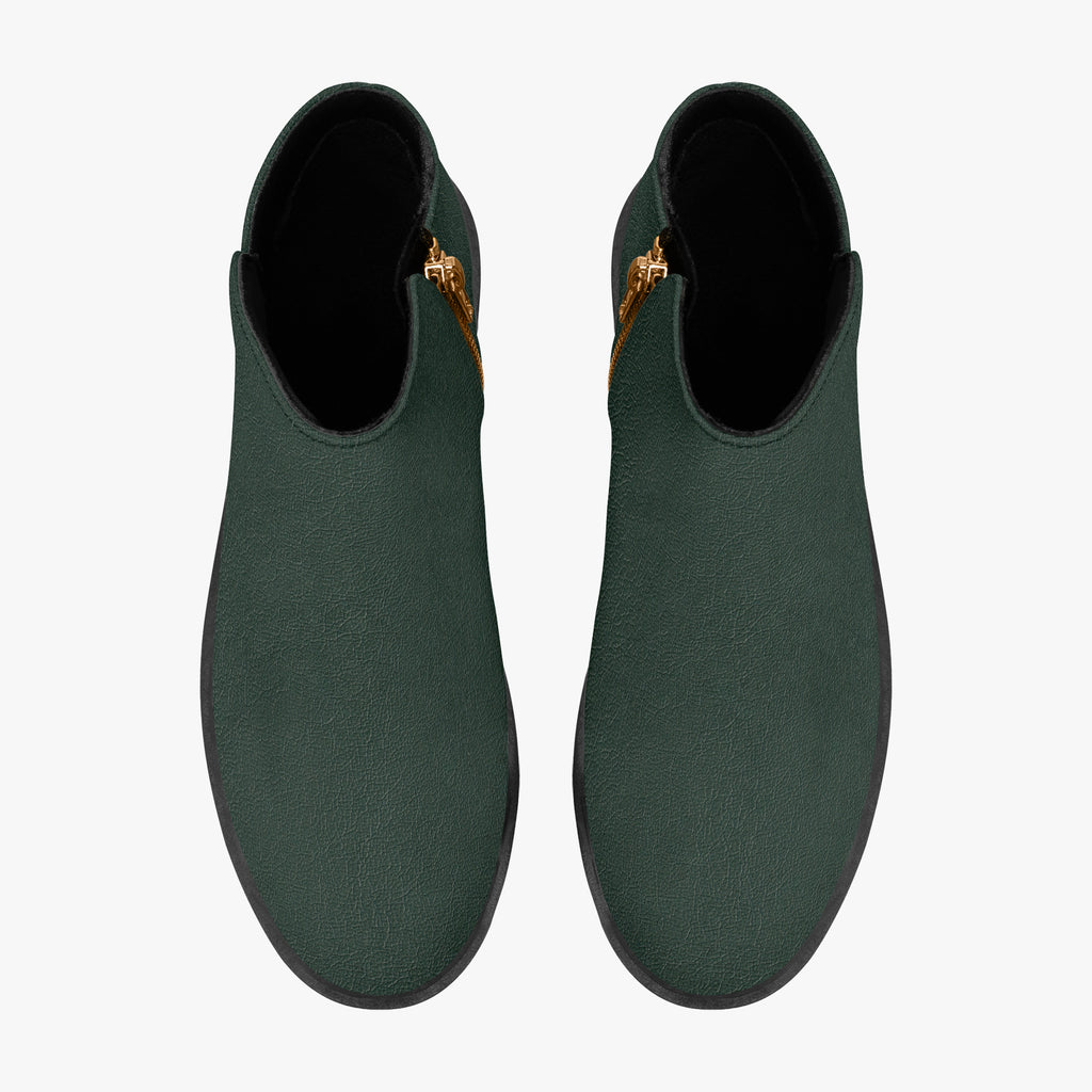 Dark green textured ankle boots with chunky black heels and gold side zipper.