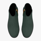 Dark green textured ankle boots with chunky black heels and gold side zipper.