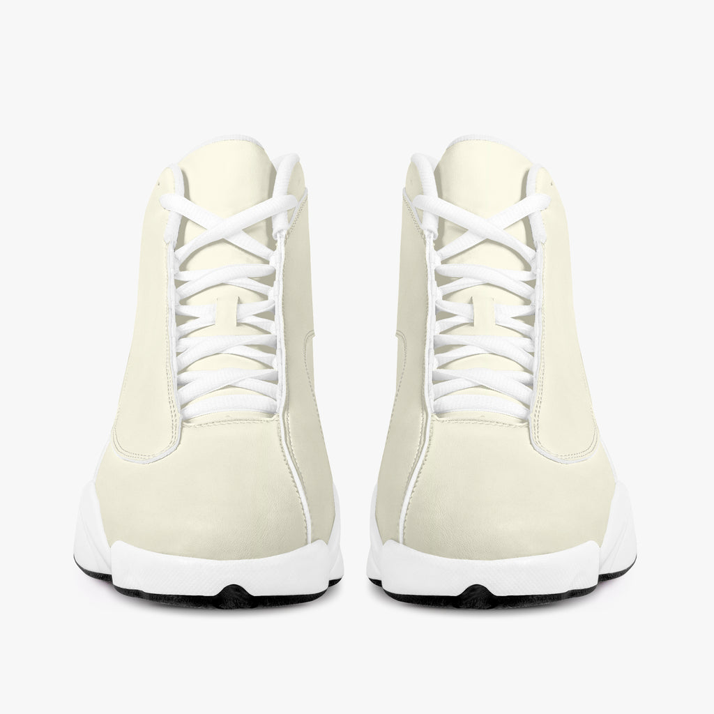 Cream and white high-top leather basketball sneakers with white laces and thick white soles.