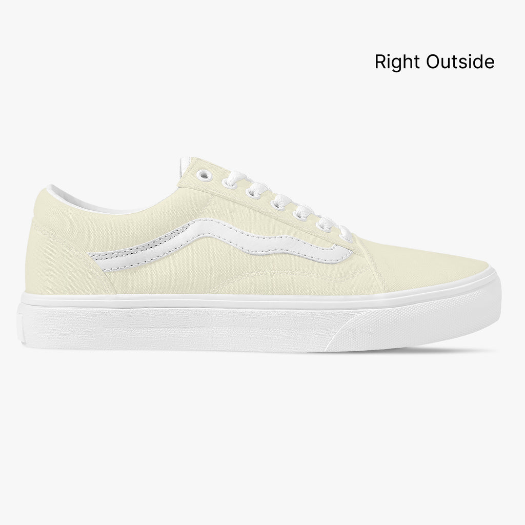Pale yellow low-top canvas sneaker with white stripe and thick white rubber sole, right outside view.