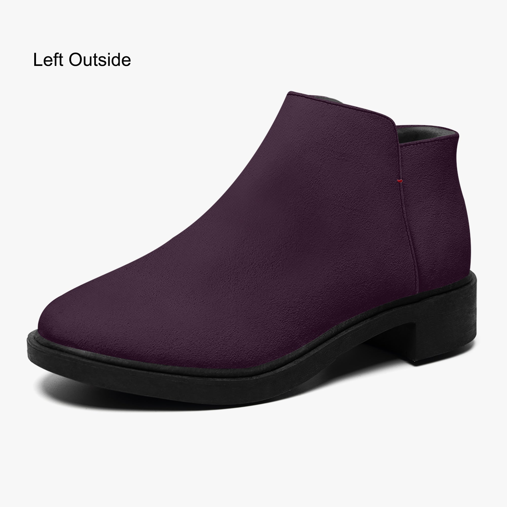 Deep plum slip-on bootie with chunky black heel and red accent stitch.