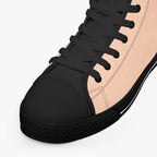 Peach and black high-top canvas sneaker with black laces and rubber sole.