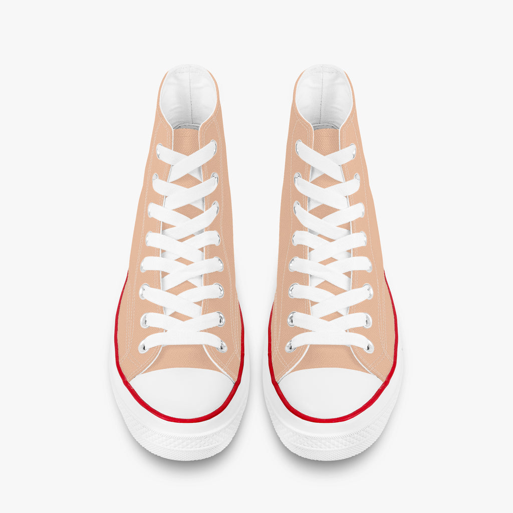 Peach high-top canvas sneakers with white laces, white toe caps, and red trim around the sole.