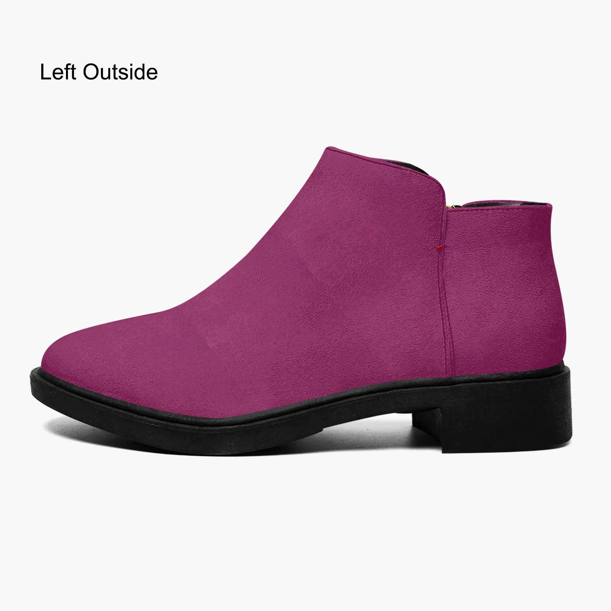 Magenta suede ankle boot with smooth upper, side zipper, and chunky black heel.