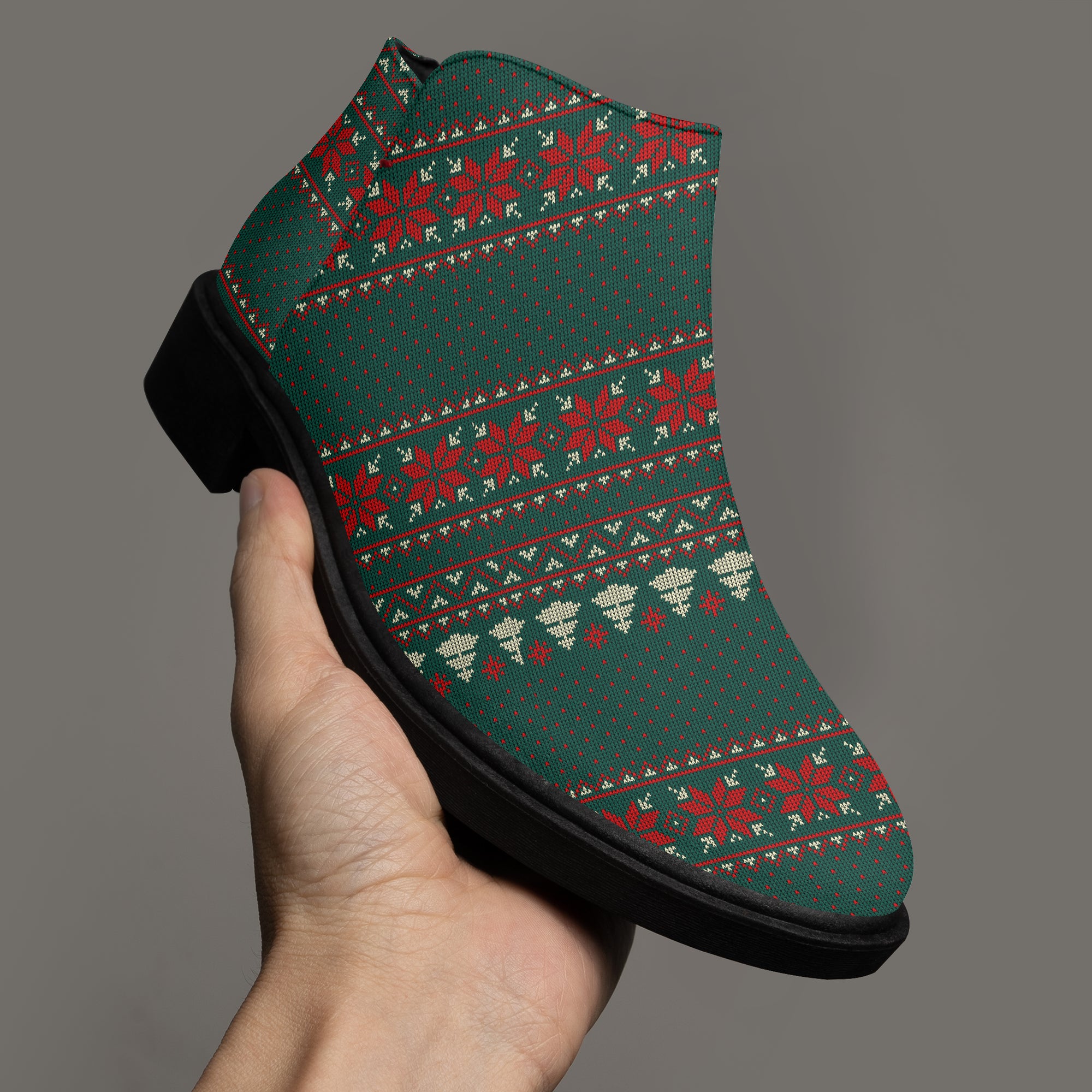 Green festive Christmas sweater ankle boot with red and cream patterns, chunky black heel, side zipper.
