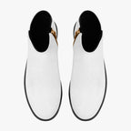 White slip-on booties with chunky black heels and red accent stitching along the zipper.