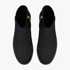 Black ankle boots with subtle gray snowflake pattern, side zipper, and chunky heel.