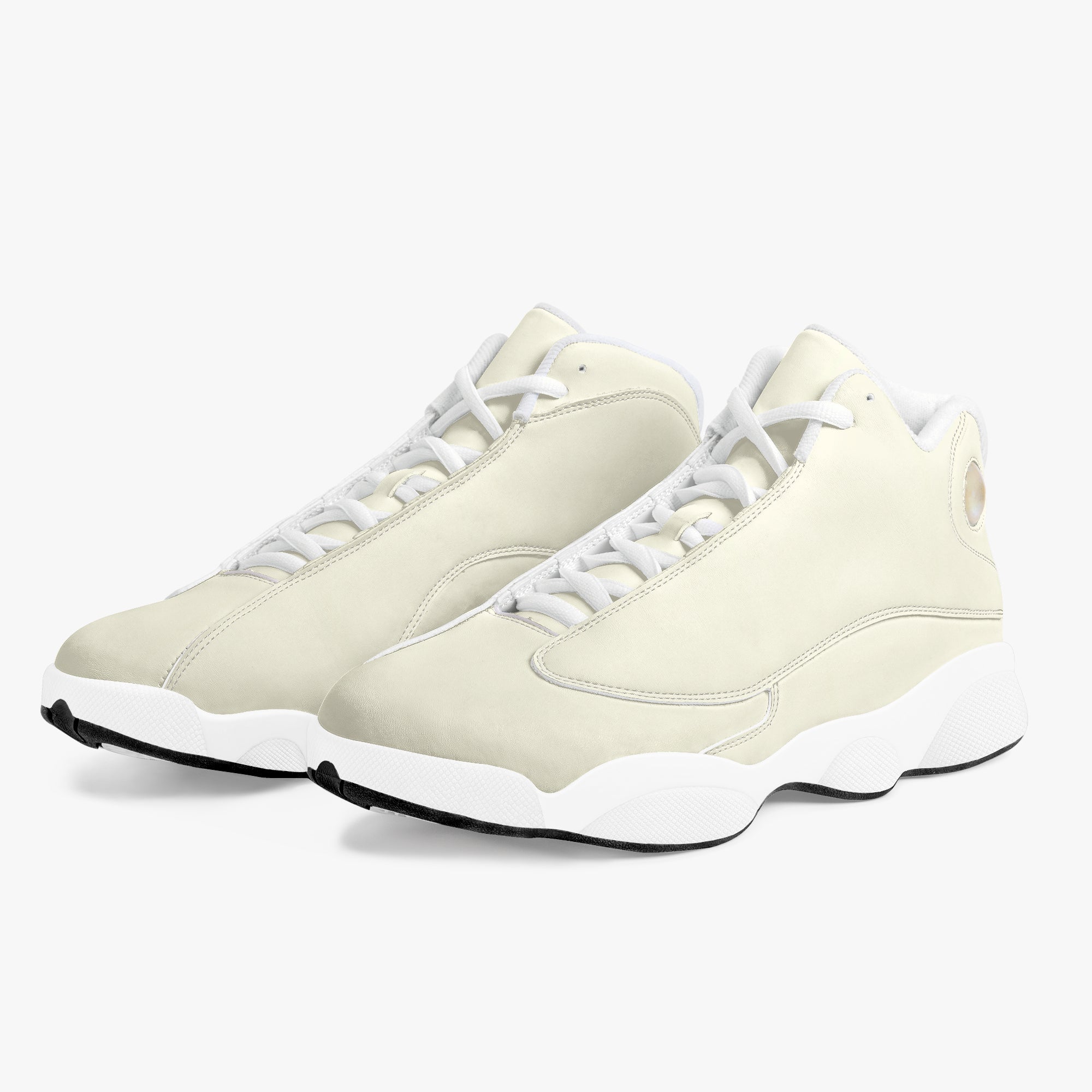 Cream and white high-top leather basketball sneakers with white laces and thick white soles.