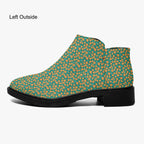 Teal ankle boot with orange floral print, chunky black heel, and side zipper.