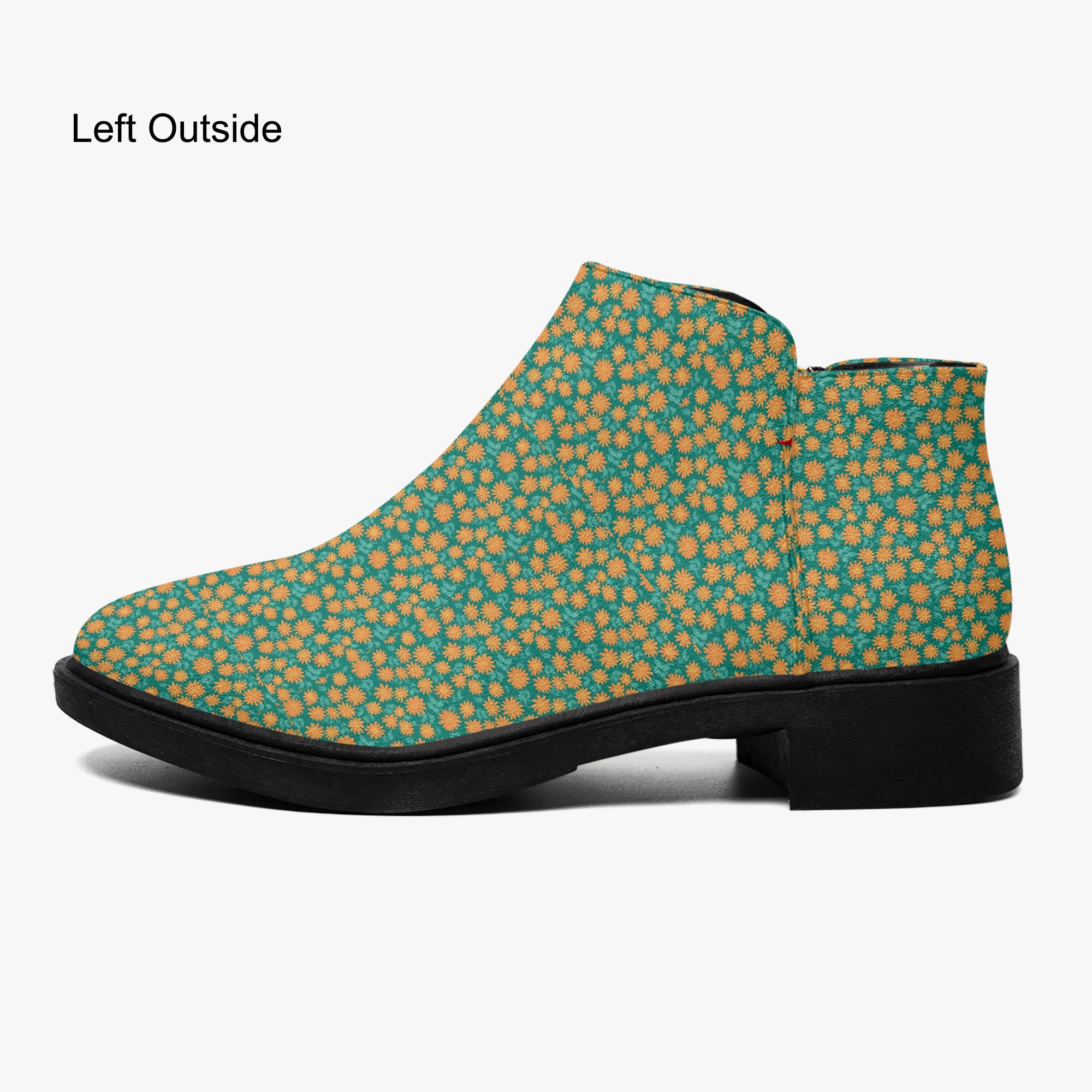 Teal ankle boot with orange floral print, chunky black heel, and side zipper.