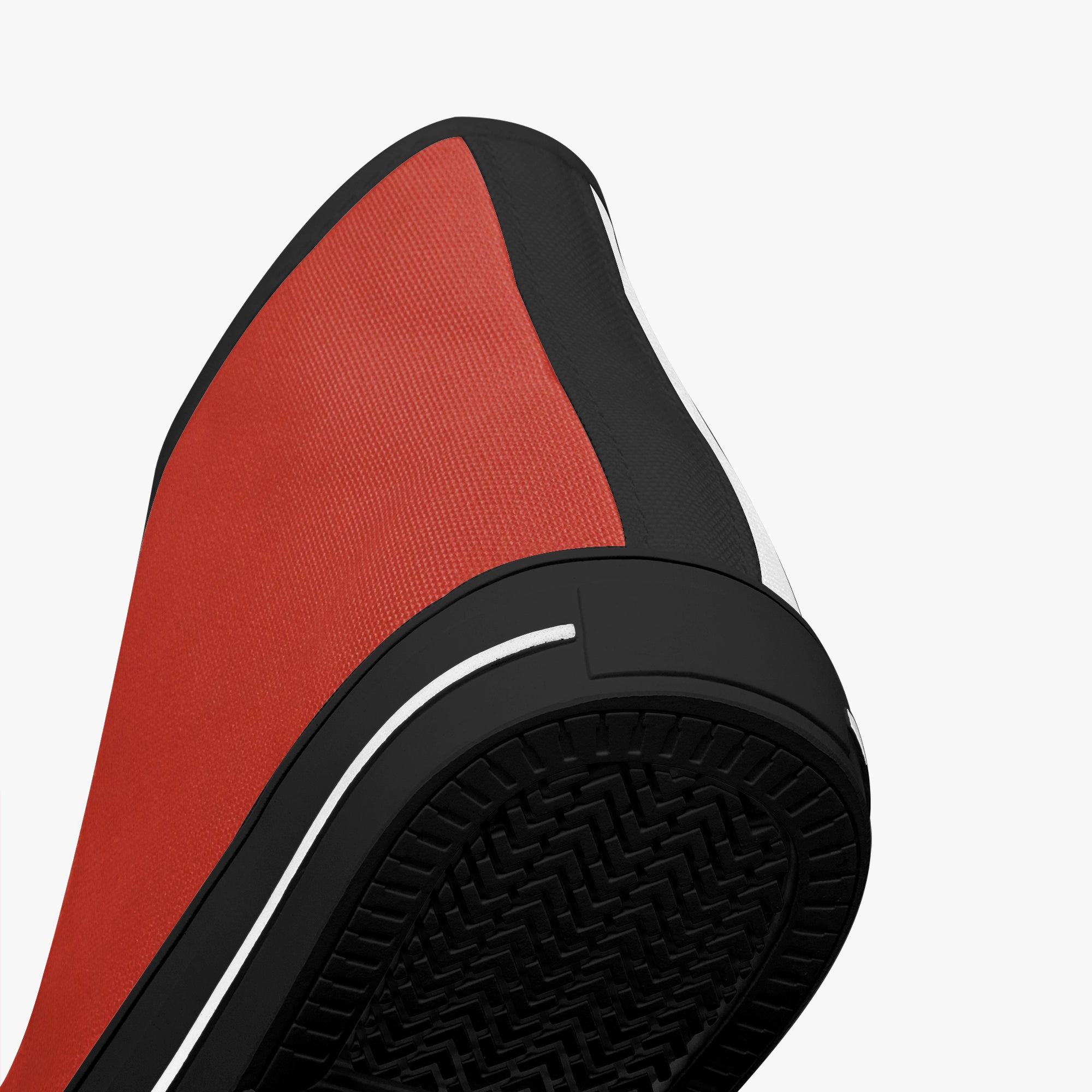 Bold red high-top canvas sneaker with black accents and textured black rubber sole.