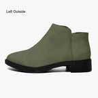 Olive green textured ankle boot with chunky black heel and side zipper.