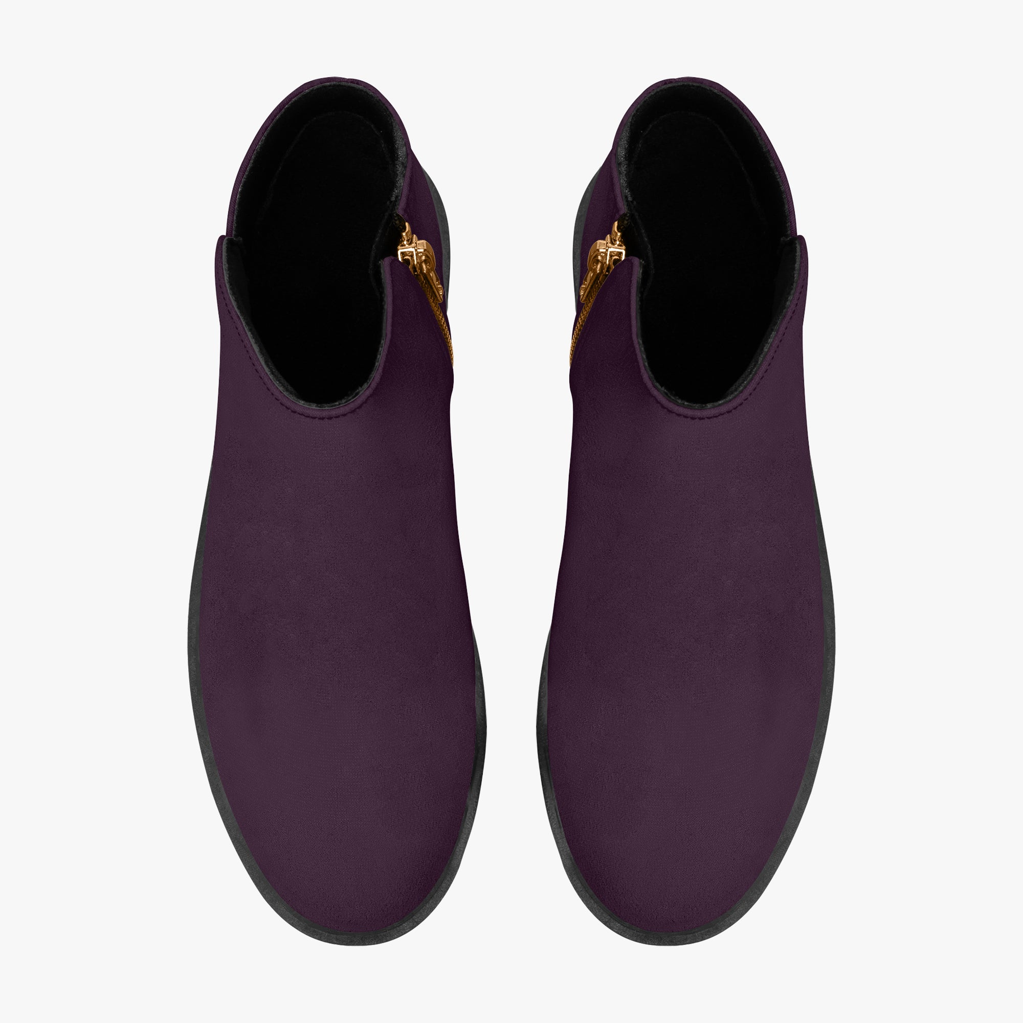 Deep plum slip-on booties with smooth matte finish and chunky black heels, gold side zippers visible.