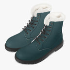 Midnight teal lace-up winter boots with plush white faux fur collar and black soles.