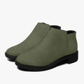 Olive green textured ankle boots with chunky black heels and side zipper closure.