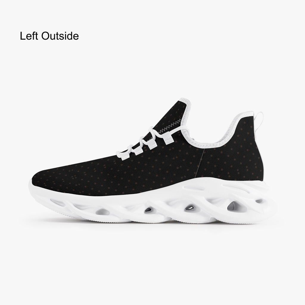 Black speckled knit sneaker with white sole and lace-up closure, side view.