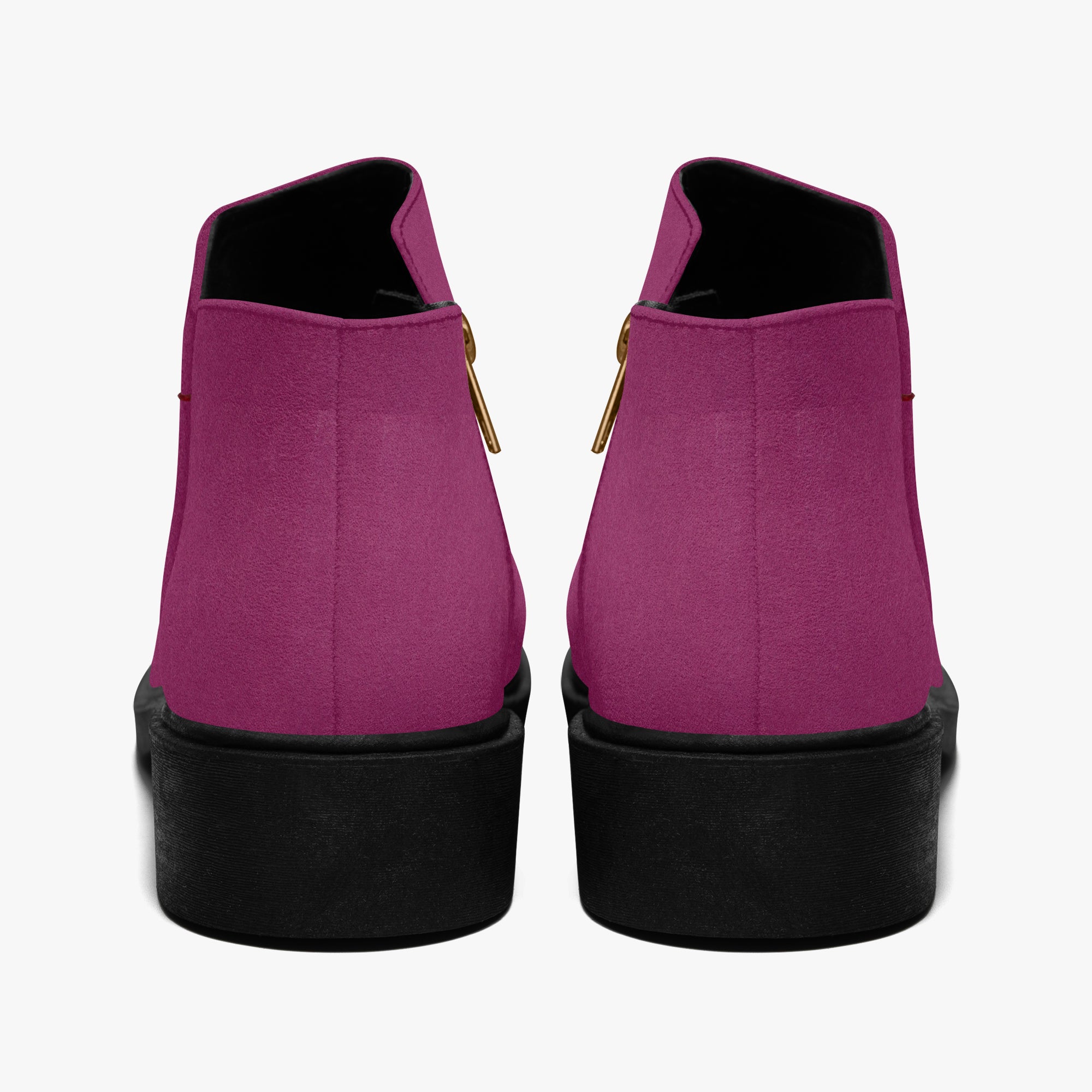 Magenta suede ankle boots with chunky black heels and gold zipper pull tabs, rear view.