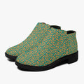 Teal ankle boots with orange floral print, black chunky heel, and side zipper.