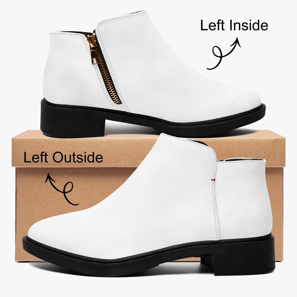 Modern white slip-on ankle booties with chunky black heel, side zipper, and red accent stitch.