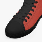 Bold red and black high-top canvas sneaker with black laces and black rubber sole.