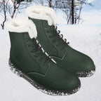 Forest green leather lace-up winter boots with white plush faux fur collar and speckled sole.