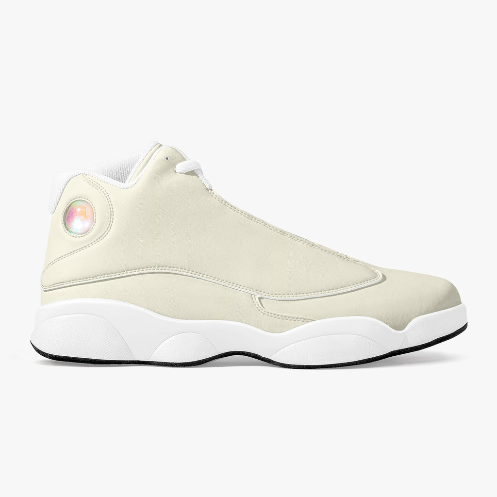 Cream and white leather high-top basketball sneaker with white laces and a wavy white sole.