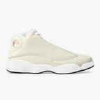 Cream and white leather high-top basketball sneaker with white laces and a wavy white sole.