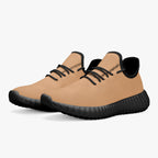 Beige knit low-top sneakers with black soles and black laces, breathable mesh design.